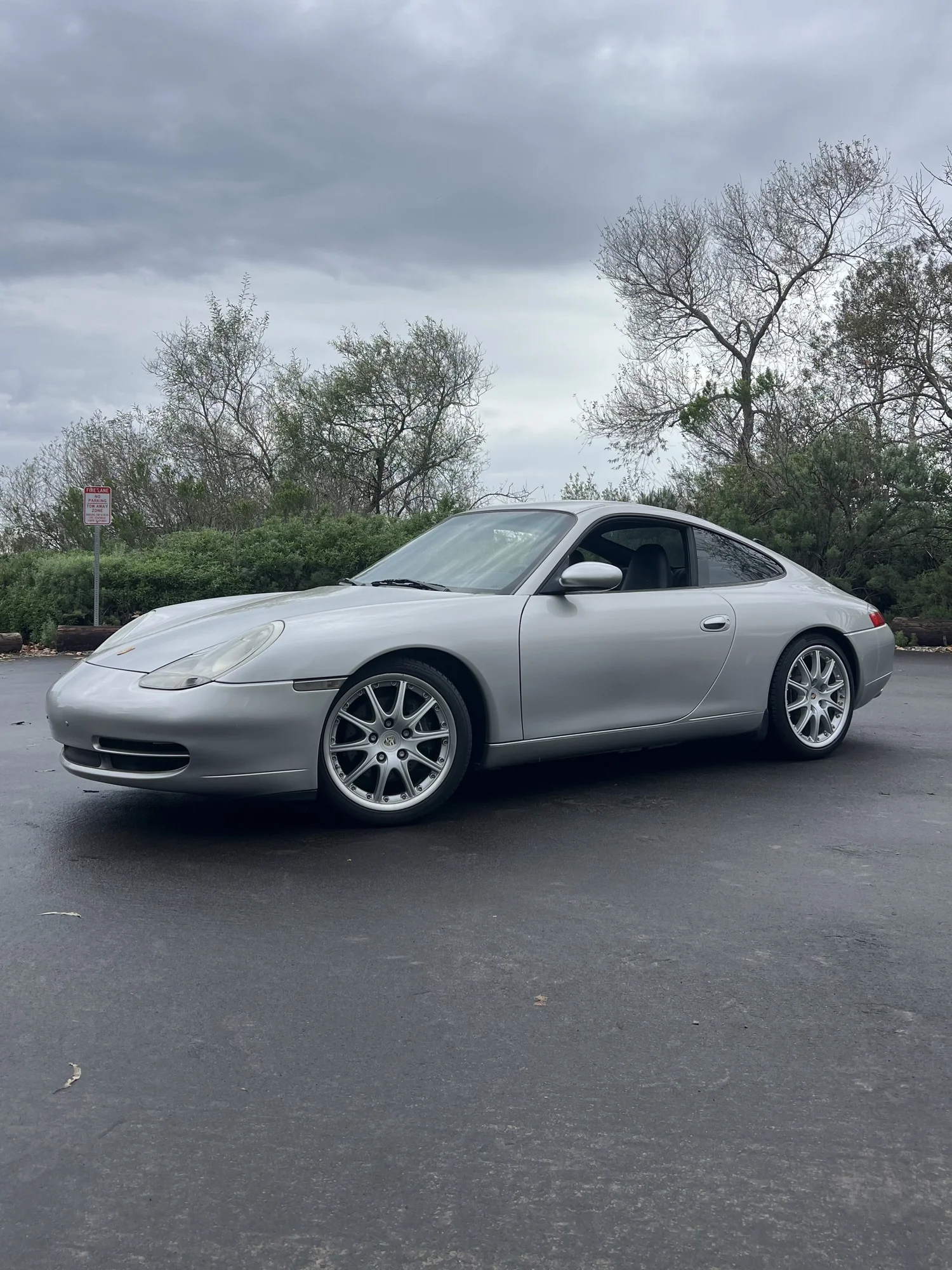 1999 Porsche 911 Carrera in Arctic Silver, front three-quarter