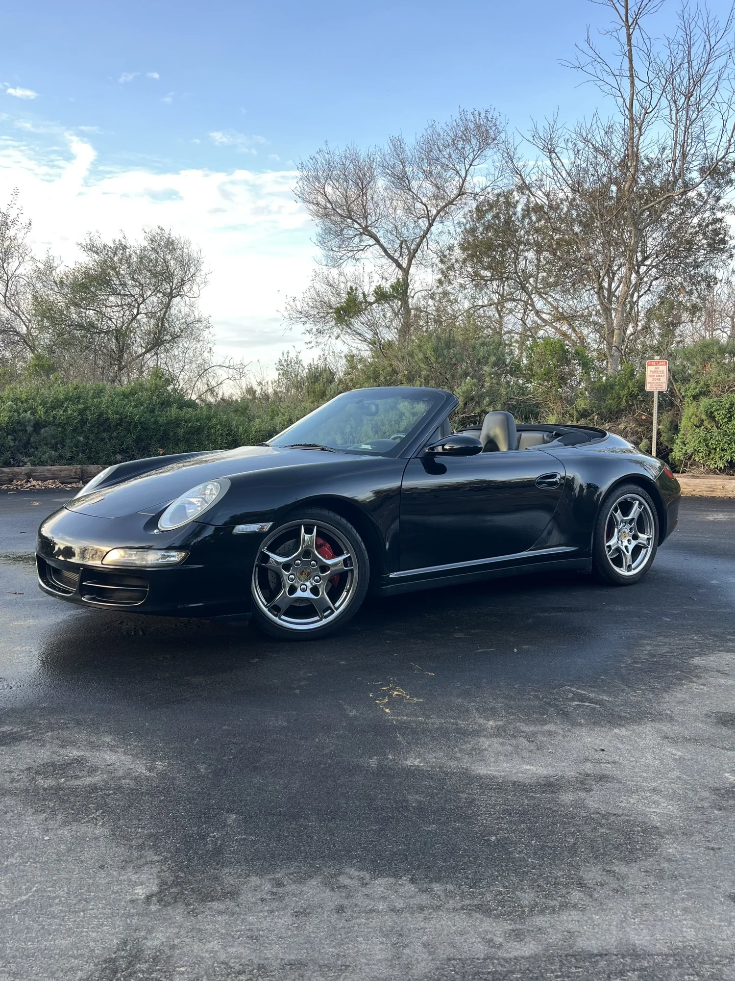2007 Porsche 911 Carrera 4S Cabriolet, front three-quarter with the top down